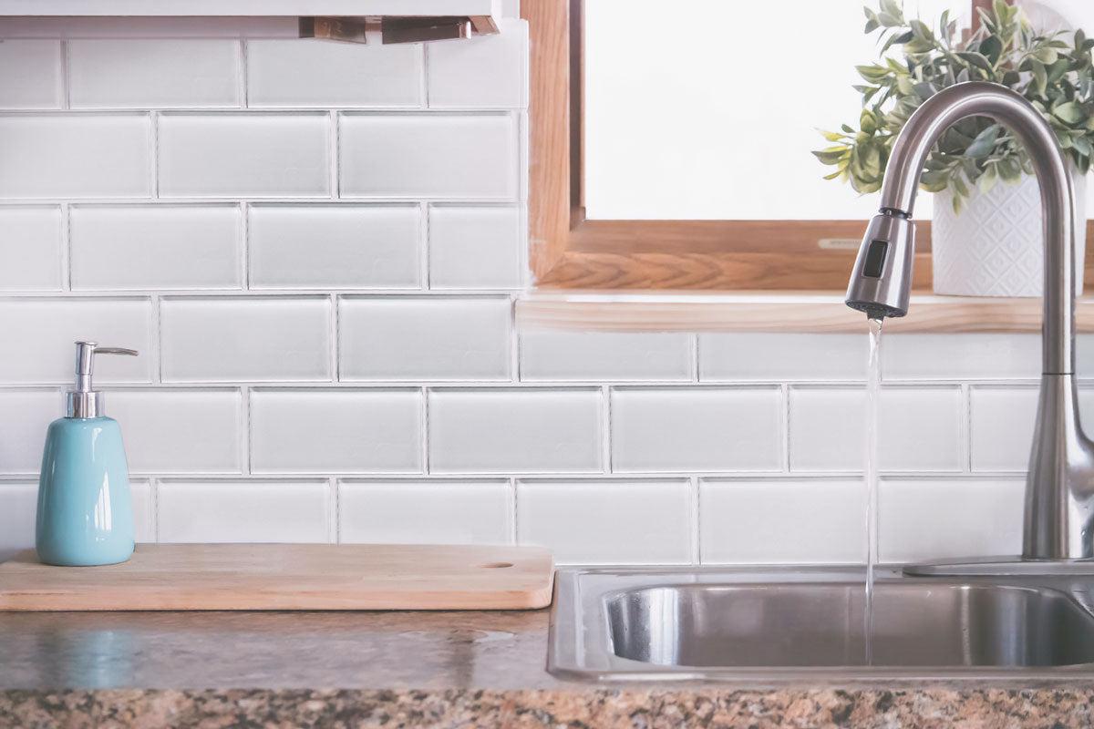 Classic white glass subway tile for a clean and contemporary kitchen