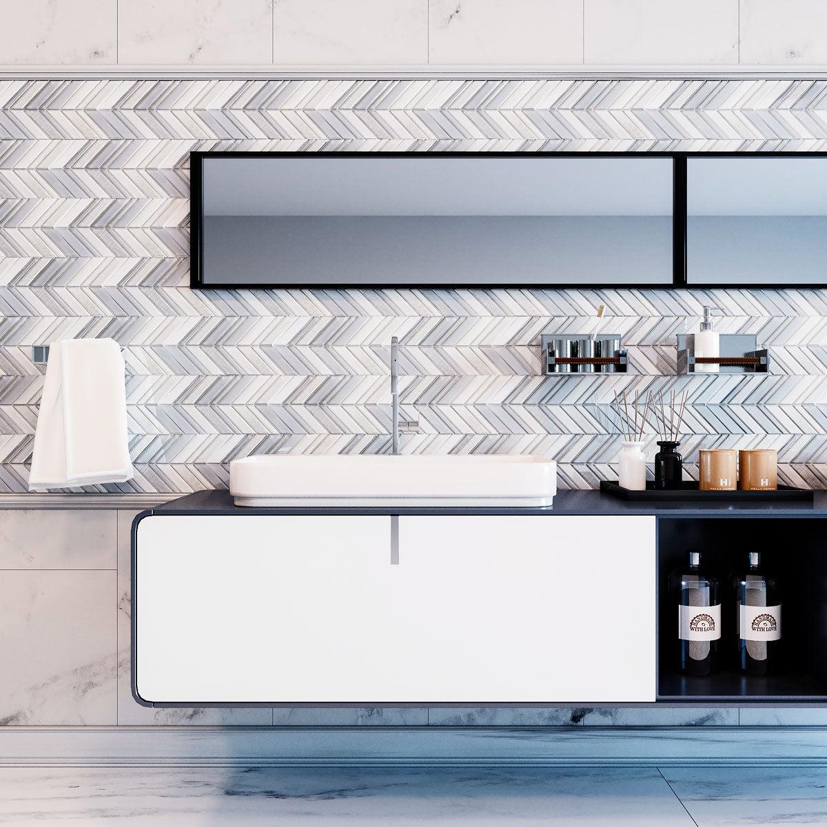 Chevron glass tile in shades of blue and gray for a patterned bathroom wall