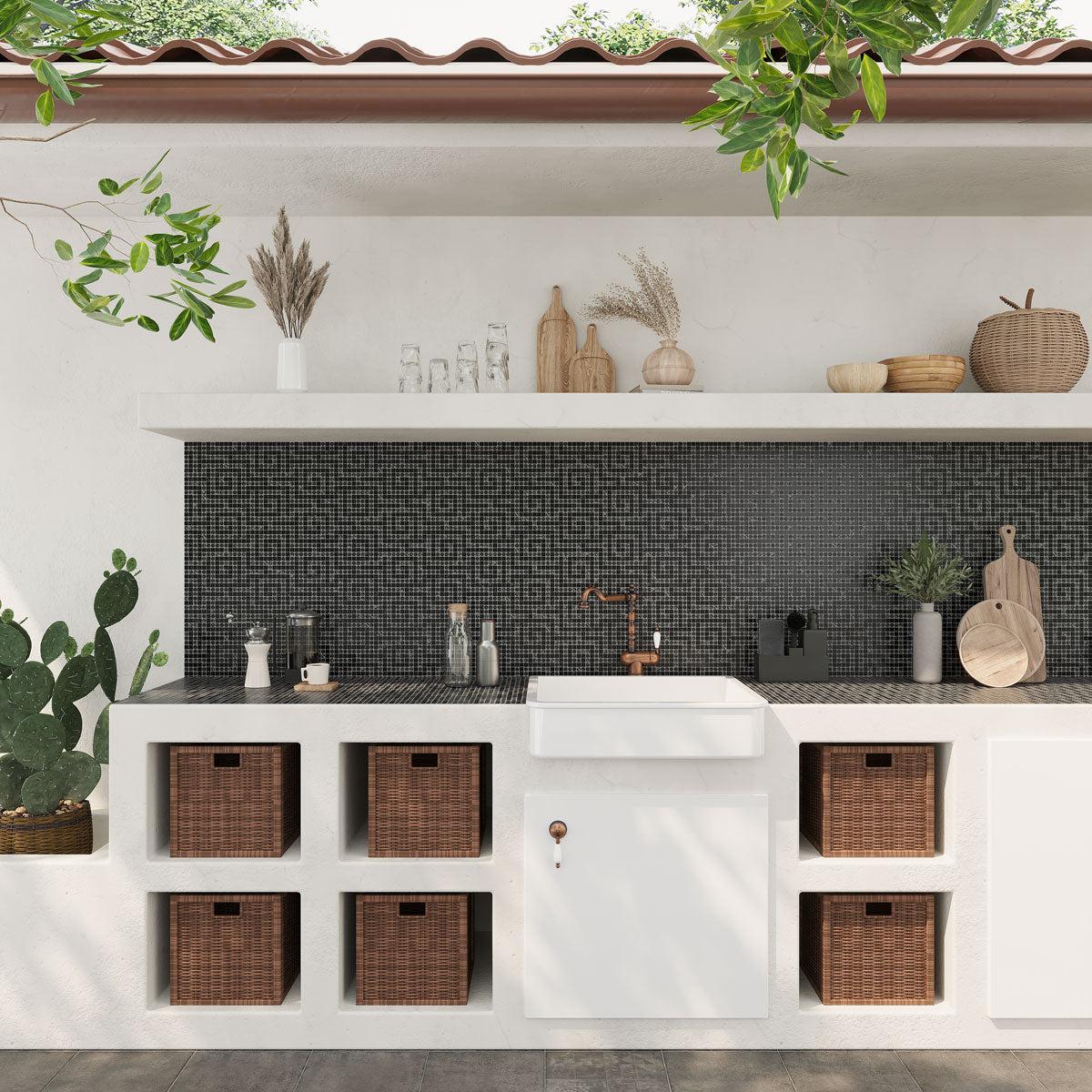 Outdoor kitchen with Southwest style and black marble mosaic backsplash