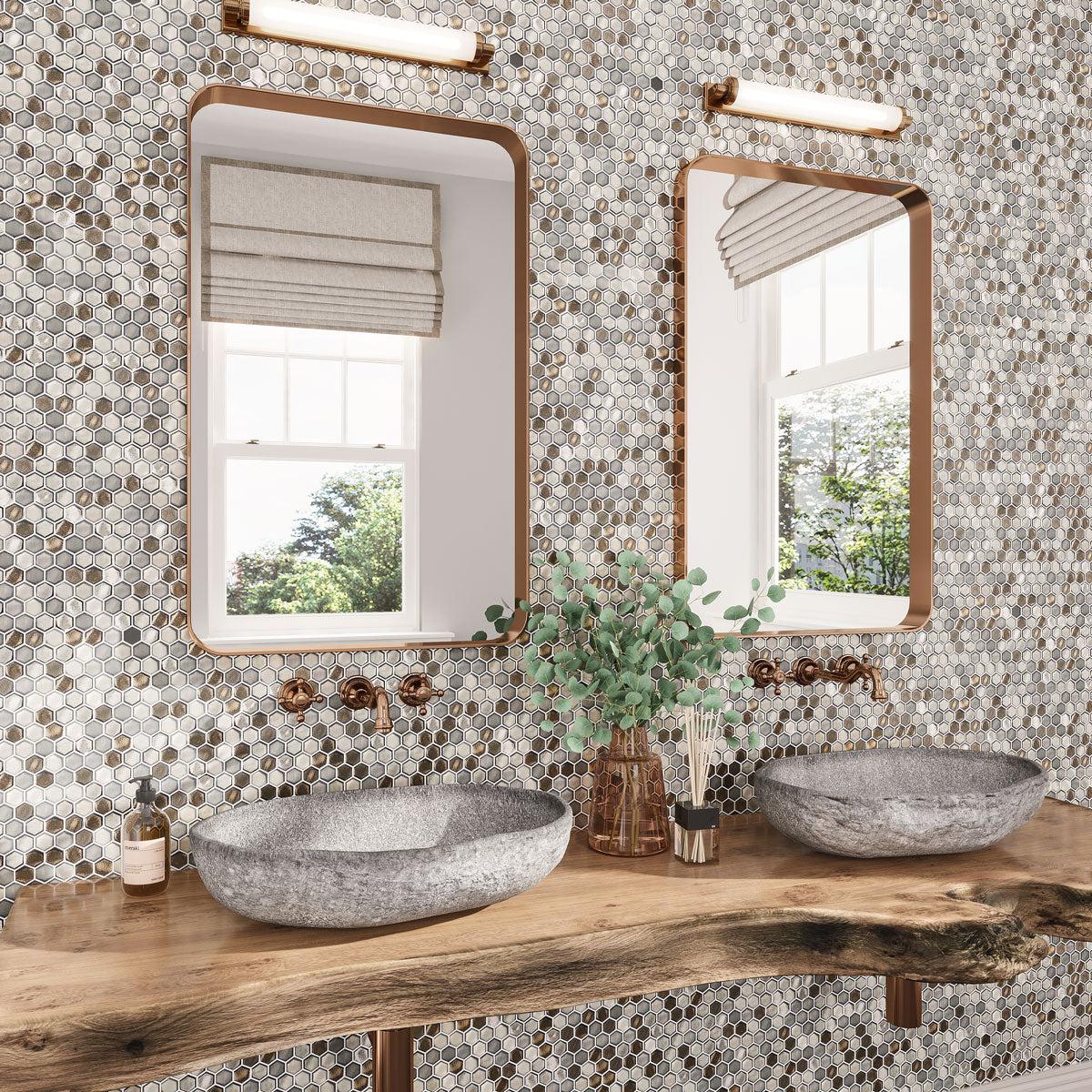 Modern organic bathroom with gray and metallic hexagon glass tiles with a live edge wood countertop