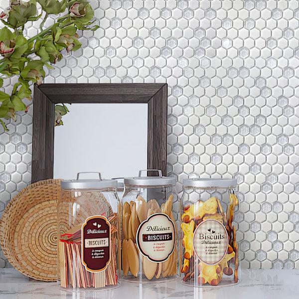 Glass Jars with Biscuits on The Background of White Recycled Glass Hexagon Mosaic Tile