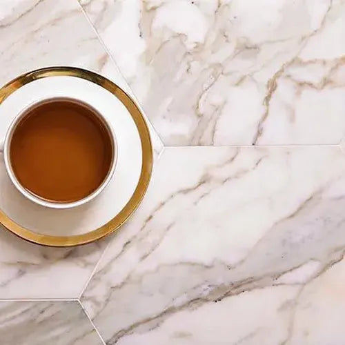 Calacatta Gold Marble Tile Floors and Walls