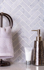 carrara herringbone tile