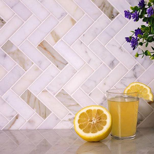 Calacatta Honed Herringbone Mosaic Tile