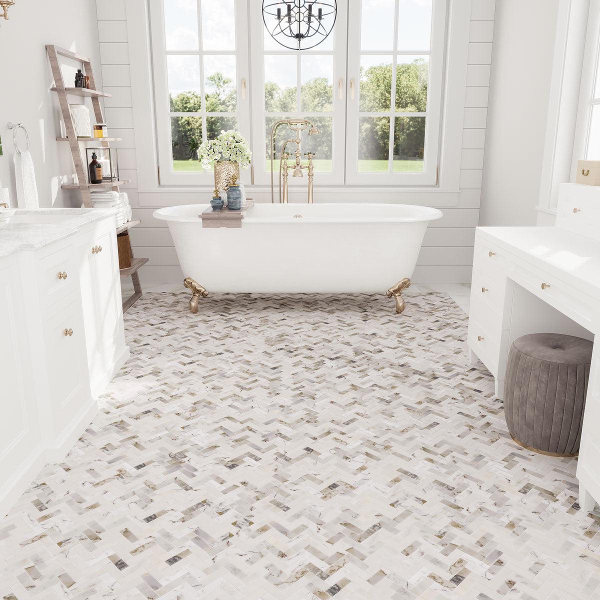 White and Gold farmhouse bathroom with marble herringbone floor design