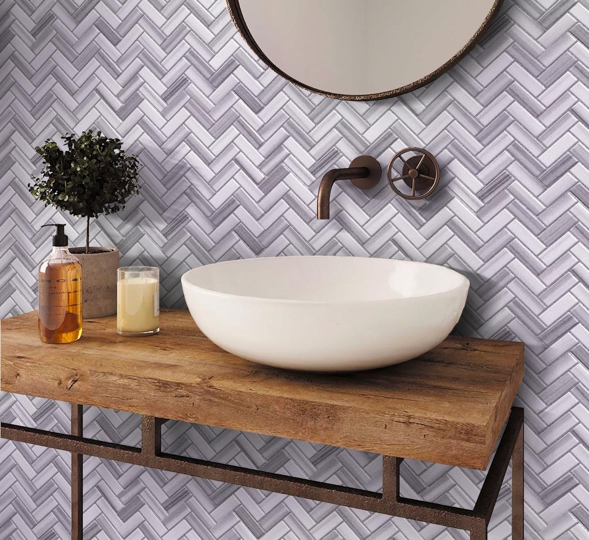 Gray and white herringbone bathroom wall