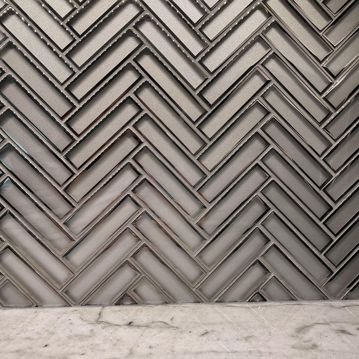 Frosted Glass and Chrome finish for an Art Deco-inspired herringbone glass tile