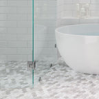 Glass Shower and White Bathtub on the Calacatta Gold Hexagon Tile Polished Floor
