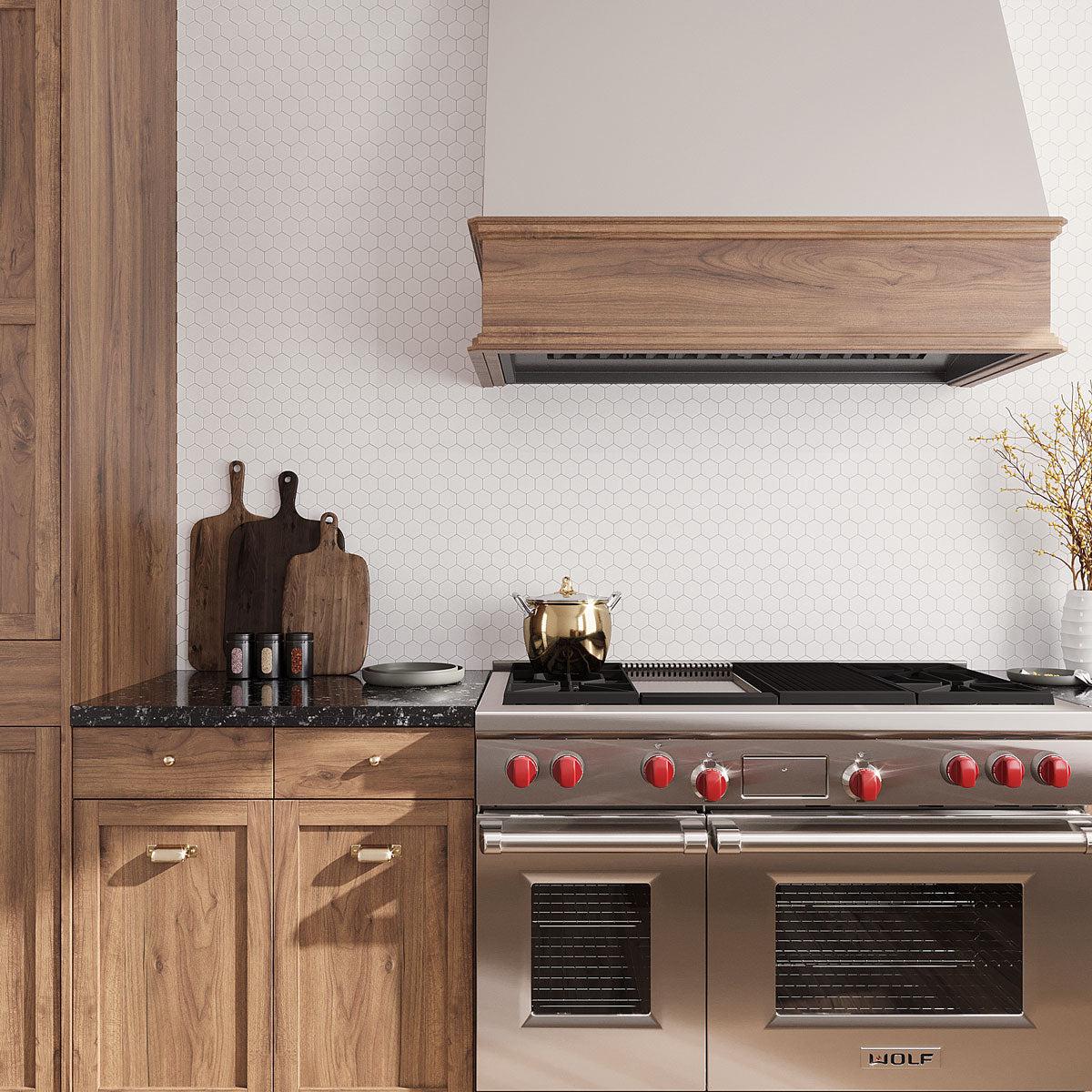 Thassos White Marble hexagon wall tiles for a kitchen backsplash with a natural wood range hood