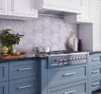 Blue and white kitchen with square white carrara mosaic tile backsplash