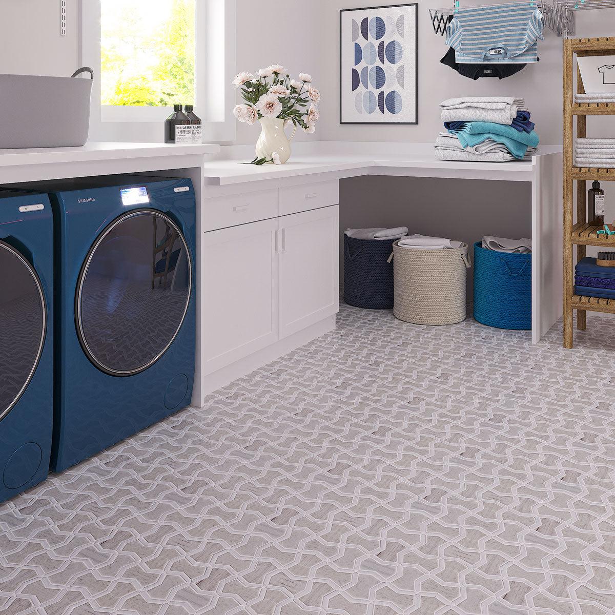 Marble laundry room floor with Sand Valley mosaic tile to add neutral color to blue appliances