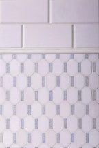 Two types of white marble tile for a backsplash