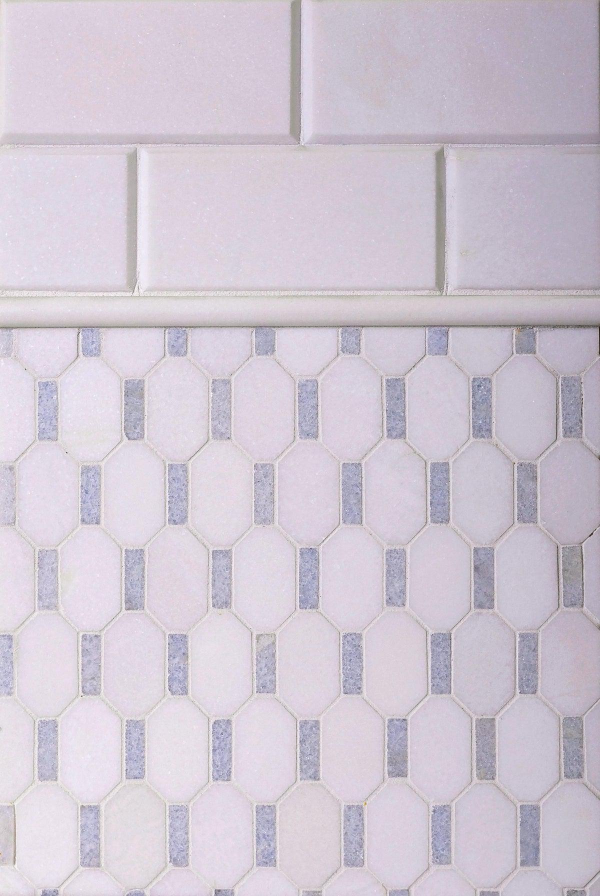 Two types of white marble tile for a backsplash