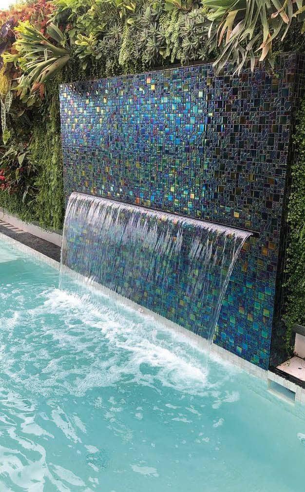 Dark multicolor glass pool tile accent wall