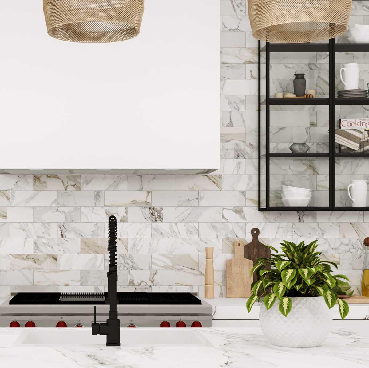 Matte black fixtures for a marble subway tile kitchen backsplash
