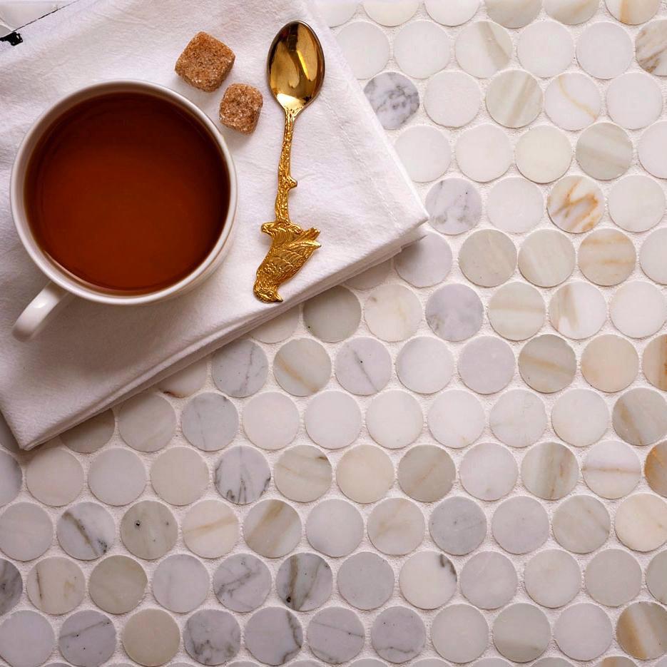 Calacatta Gold Penny Tile with a Honed Finish