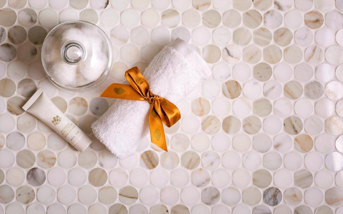 Calacatta Gold Marble 1.2" Penny Tile Polished | Tile Club