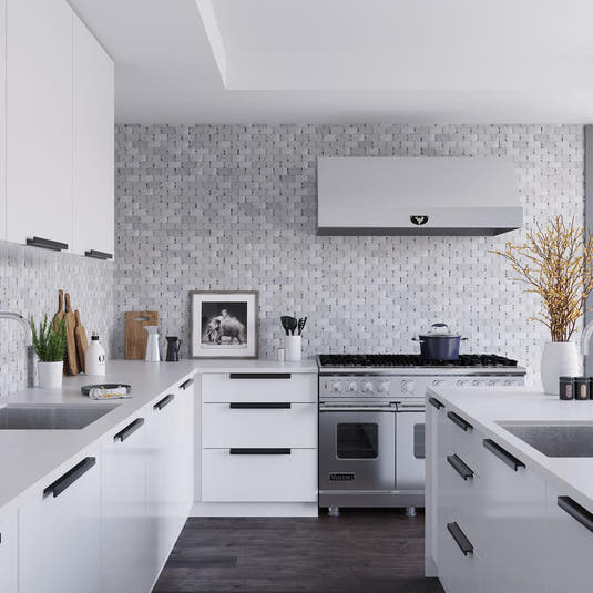 Carrara Subway Tile Backsplash With Bardiglio Dot Mosaic Tile for a Modern Kitchen