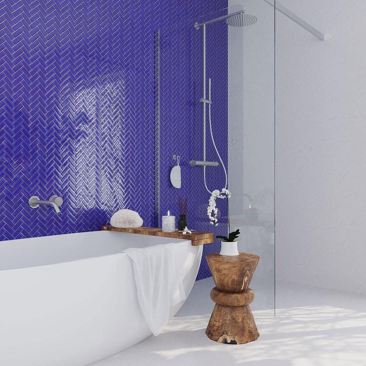 Add a pop of Cobalt Blue with this Glass Herringbone Tile Bathtub Wall 