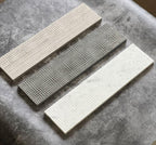 Etched marble subway tile