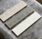 Etched marble subway tile