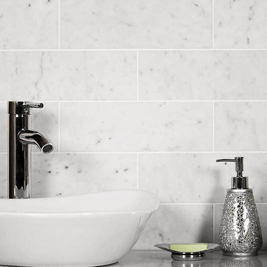 Carrara marble subway tile bathroom backsplash