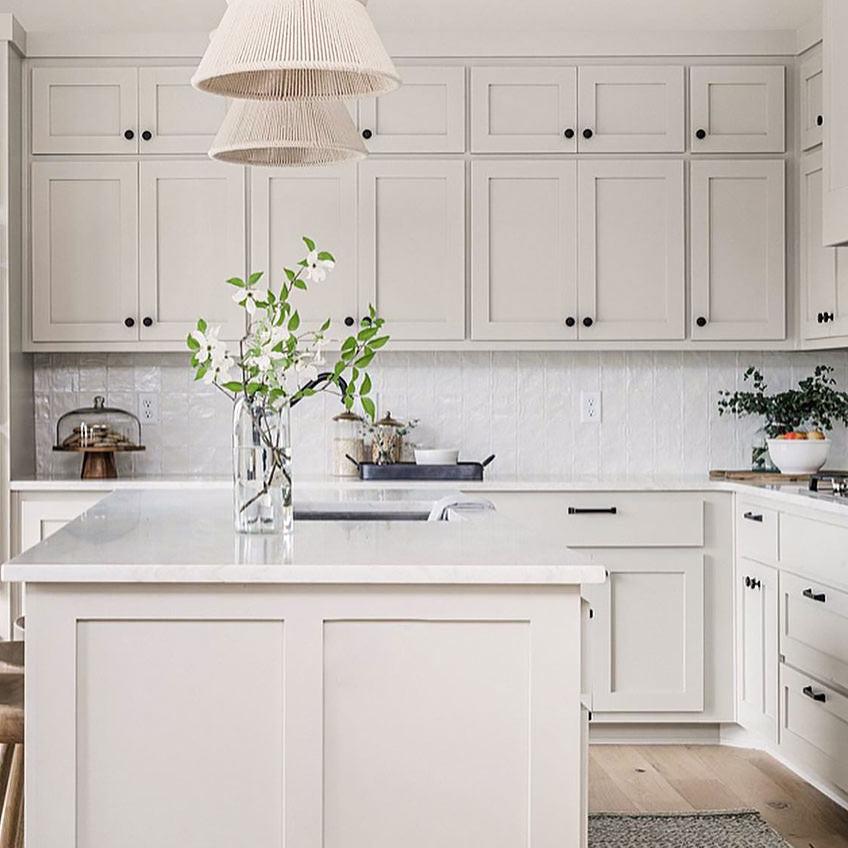 Fixer to Fabulous airy white kitchen with Mallroca White square ceramic tiles
