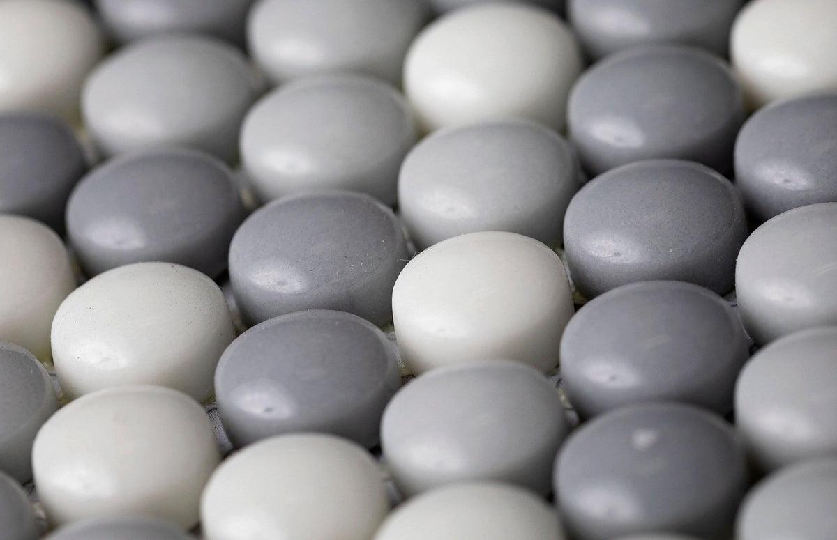 grey penny round tile