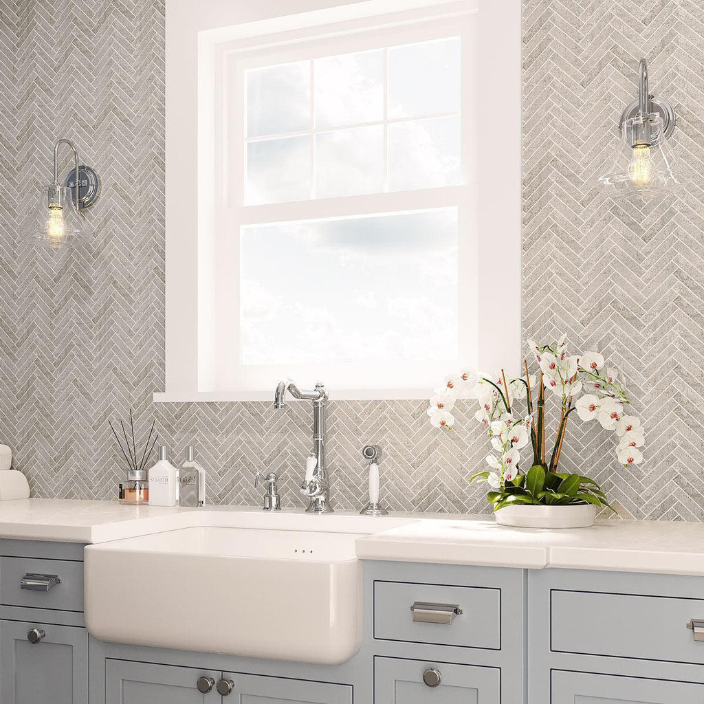 Ionic Herringbone White Porcelain backsplash for a blue and white laundry room