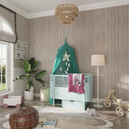 Trendy nursery design with gray slat wall accents