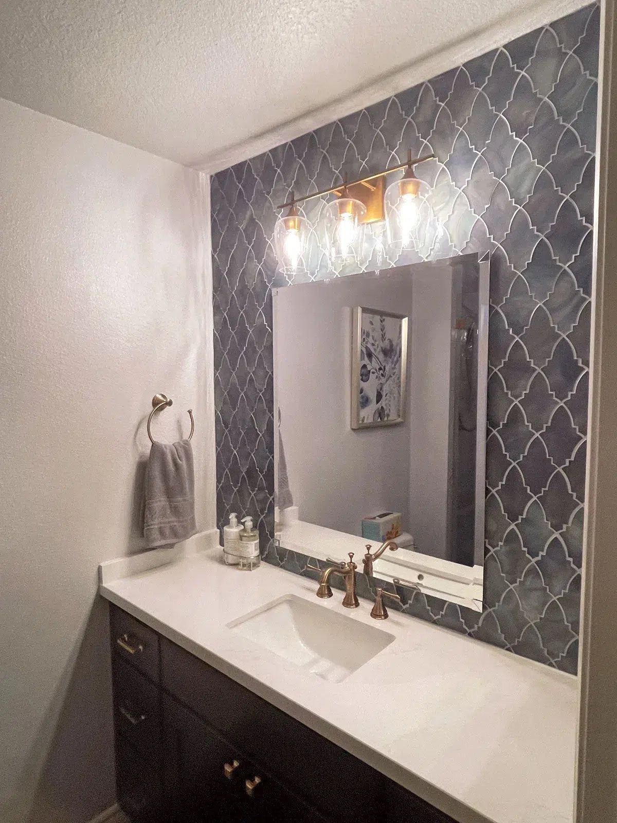 Brass and Dark Wood Bathroom Vanity with Sea Glass Louvre Blue Mosaic Tile