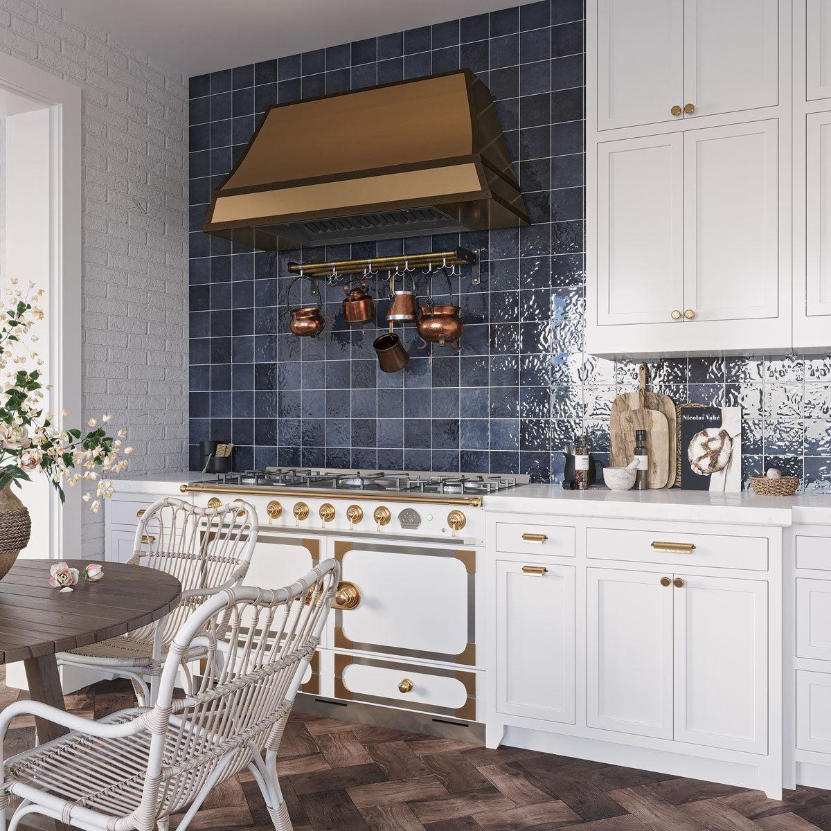 Blue and White French Country kitchen with a bold blue backsplash with Tile Club La Riviera Blue Reef