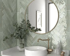 Herringbone pattern subway tile bathroom backsplash with Lake Mint Ceramic tiles
