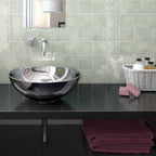Pastel green ceramic square tiles for a refreshing bathroom design