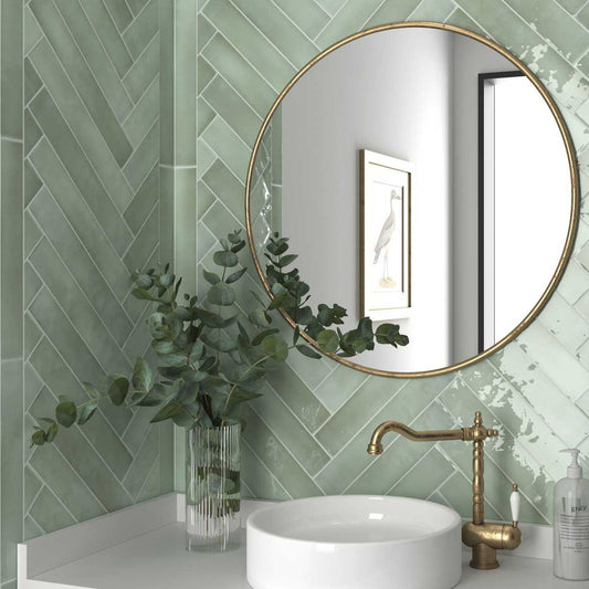 Herringbone pattern subway tile bathroom backsplash with Lake Mint Ceramic tiles