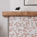Pink marble scale tile for a Scandinavian living room fireplace design