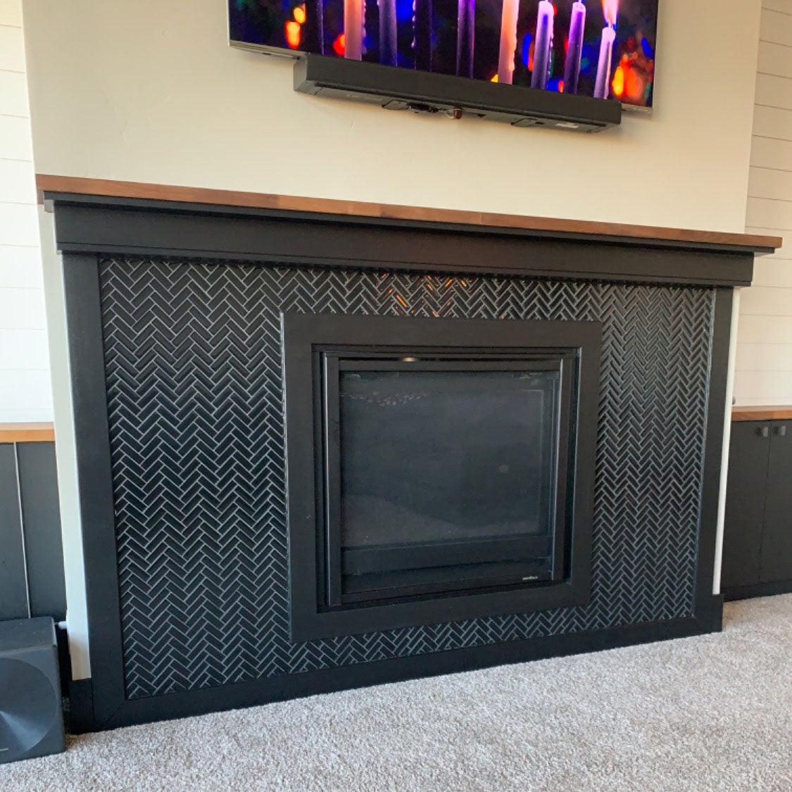 Obsidian Black Herringbone Glass Tile Fireplace Surround