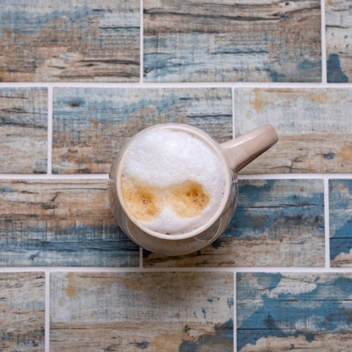 Recycled Glass Eco-Friendly Tile with a Blue Wood Look in a Subway Tile Mosaic