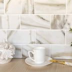 Recycled Glass Subway Tile with Calacatta Gold Marble Design