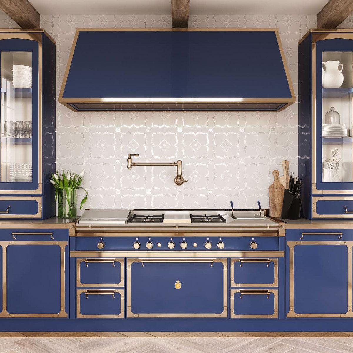 Blue, White, and Gold Kitchen with Pearl Flower White Marble and Shell Waterjet Backsplash over the French Style Double Range and matched hood