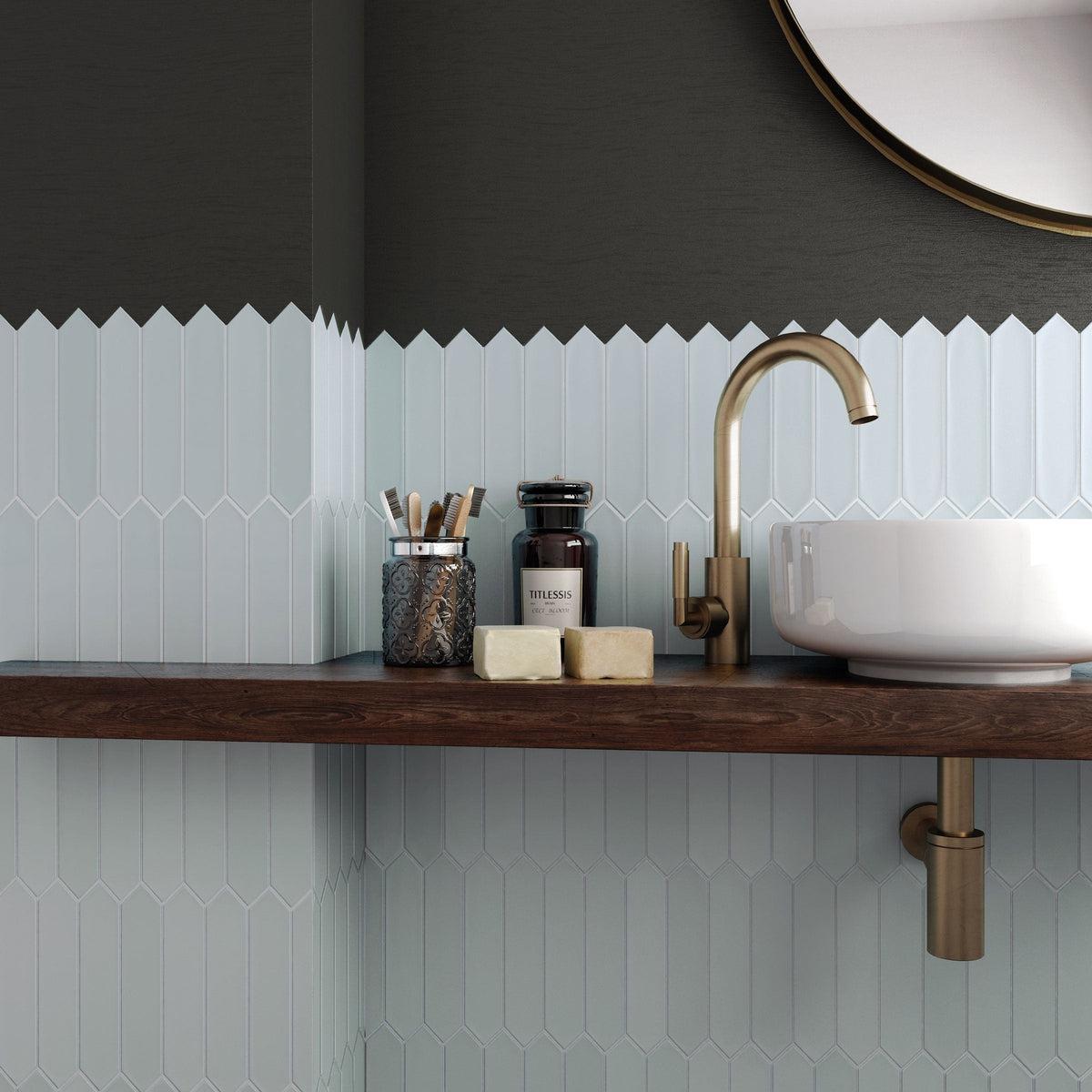 Blue ceramic picket tile bathroom sink backsplash