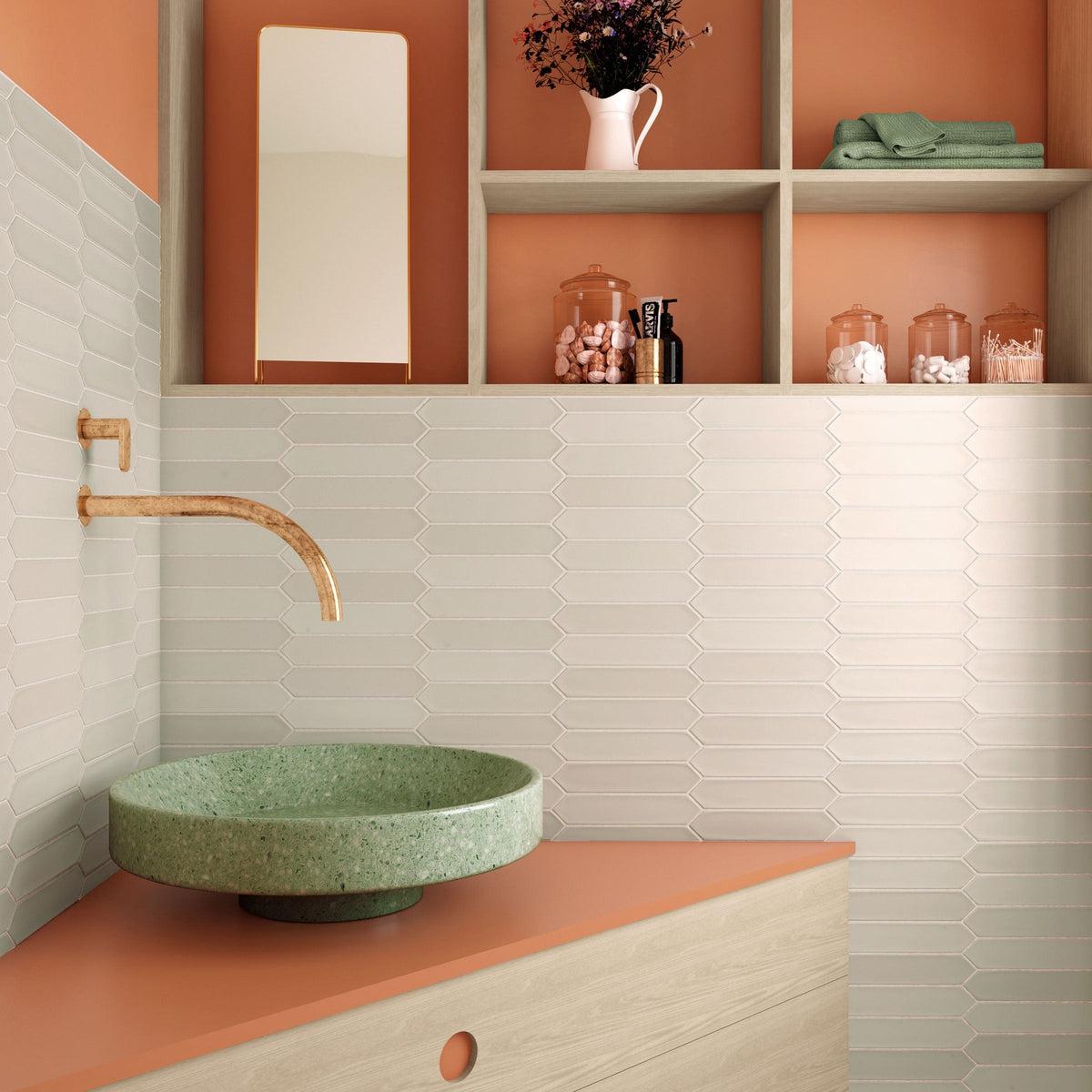 Tan ceramic picket tile bathroom sink backsplash