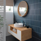 Navy blue ceramic picket tile bathroom wall