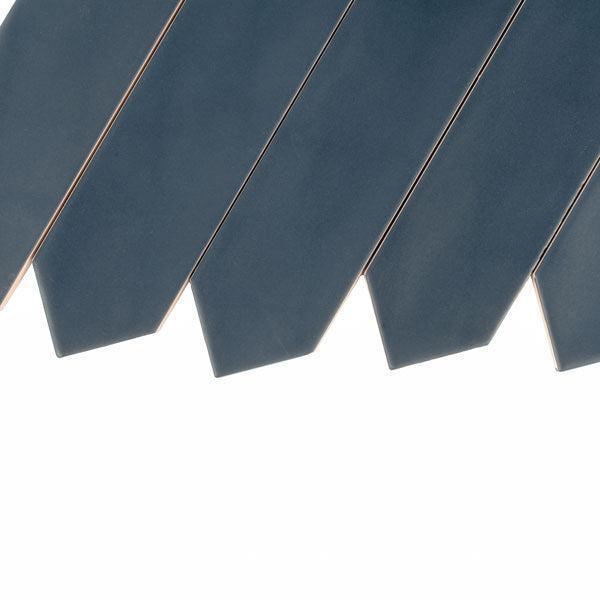 Navy blue ceramic tiles close up