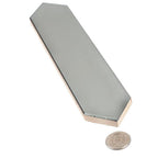 Silver ceramic tile with coin