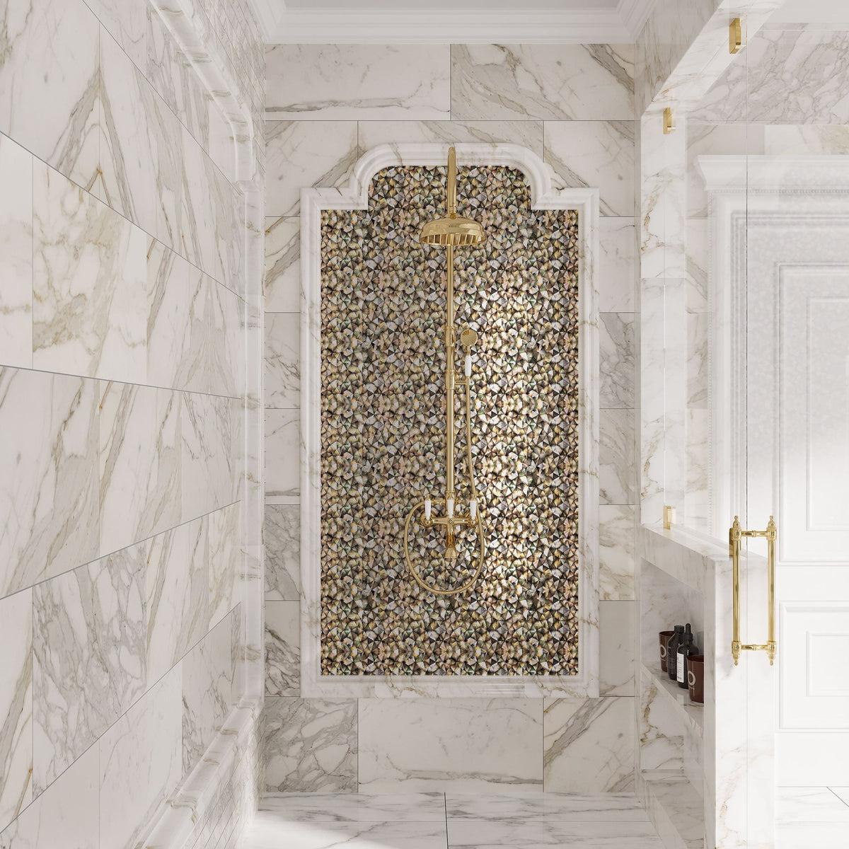 Marble bathroom with mother of pearl tile accent wall
