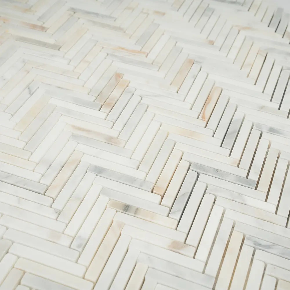Calacatta Gold Skinny Herringbone Mosaic Tile | Tile Club