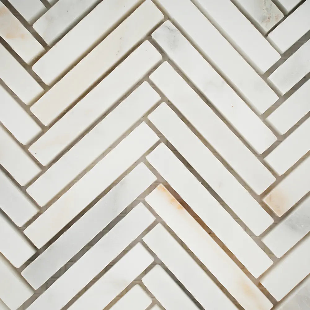 Calacatta Gold Skinny Herringbone Mosaic Tile | Tile Club