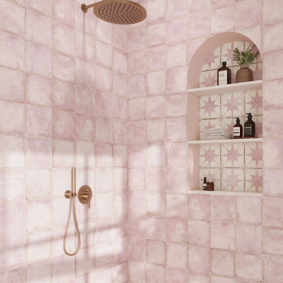 Pink shower wall tile and decorative niche