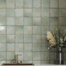 Soft green wall tiles for a low maintenance backsplash